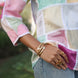 aesthetic shot of a multicolored silk chanderi shirt with a contrast colored cuff design with white laces 