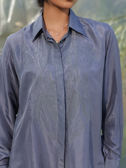 Grey Silk Dori embroidered shirt worn by a person with a blurred natural background