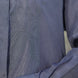 Close-up of a greygarment with grey tulip dori embroidery
