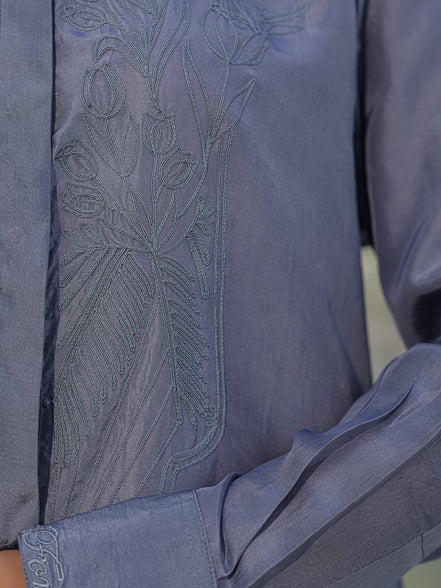 Close-up of a greygarment with grey tulip dori embroidery