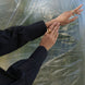stylish pleated cuffs of a black shirt