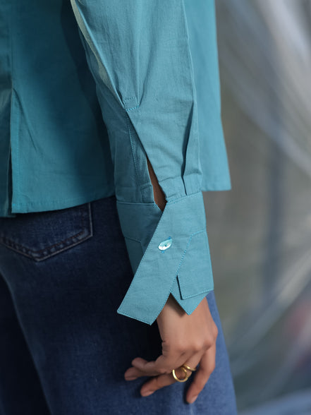 aesthetic cuff design of a teal blue shirt