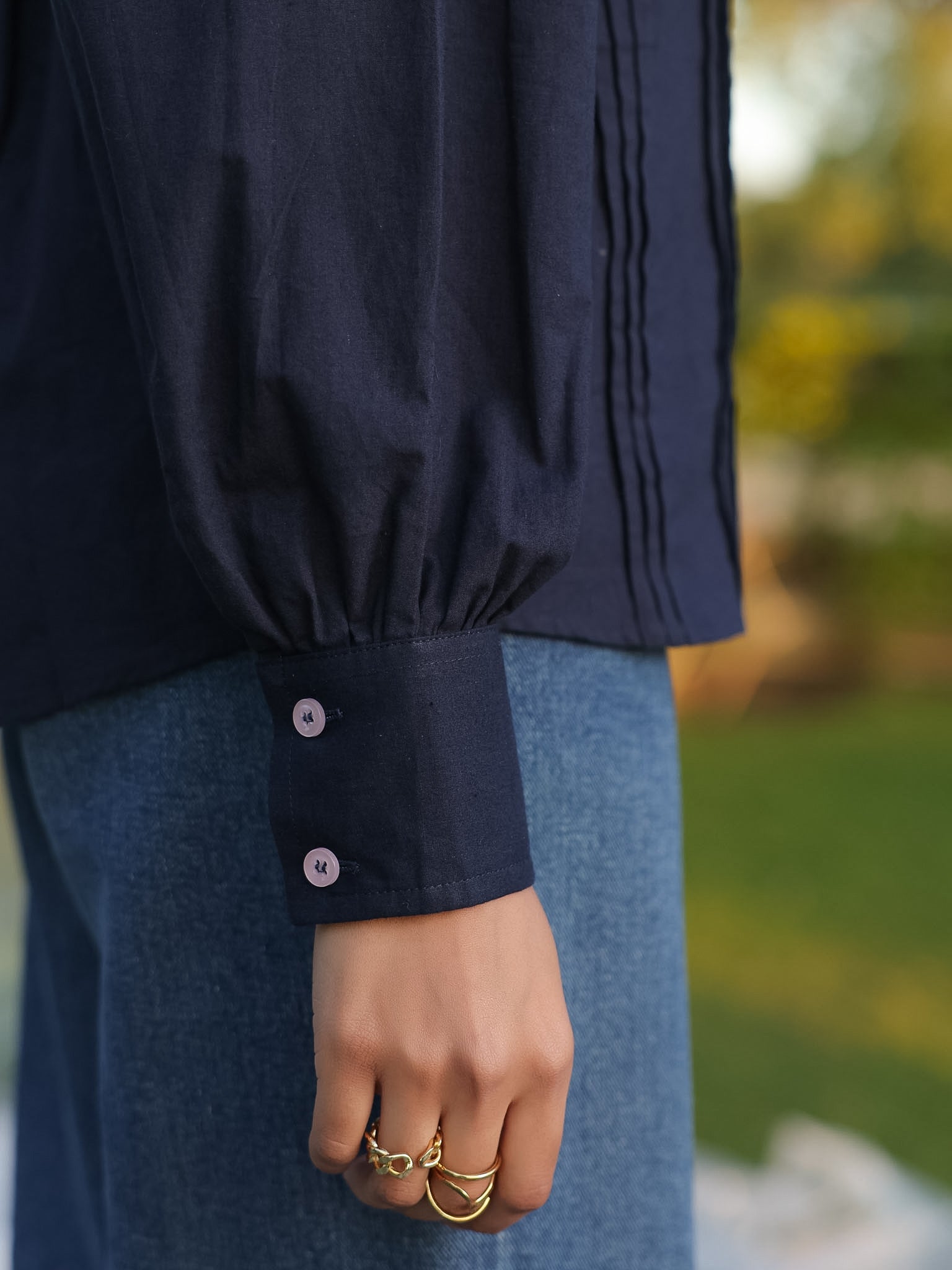Smart and stylish cuff of a nacy blue cotton shirt