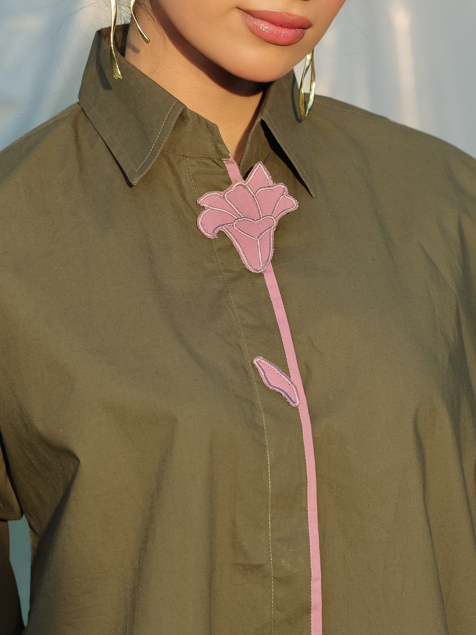 olive green shirt with contrast pink tulip embroidery patch motif