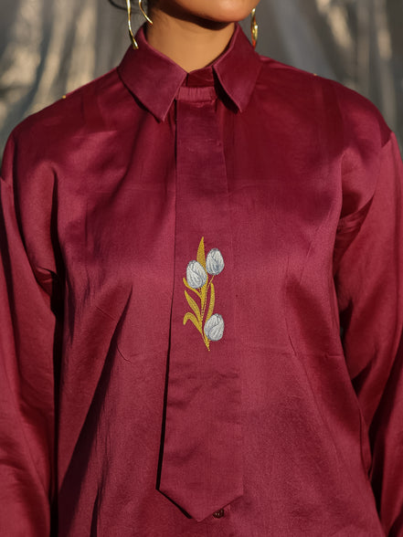 smart and unique and designer shirt with a resham embroidered tulip tie